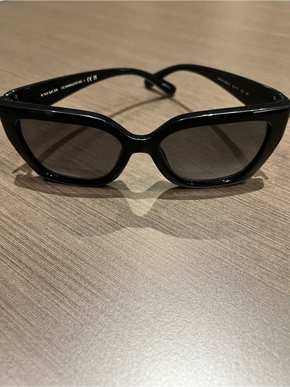Coach Women's Black Cat-Eye Sunglasses with Dark Lenses